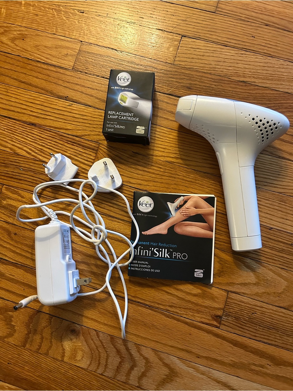 Veet Infini'Silk Pro Hair Removal Device in White, laser